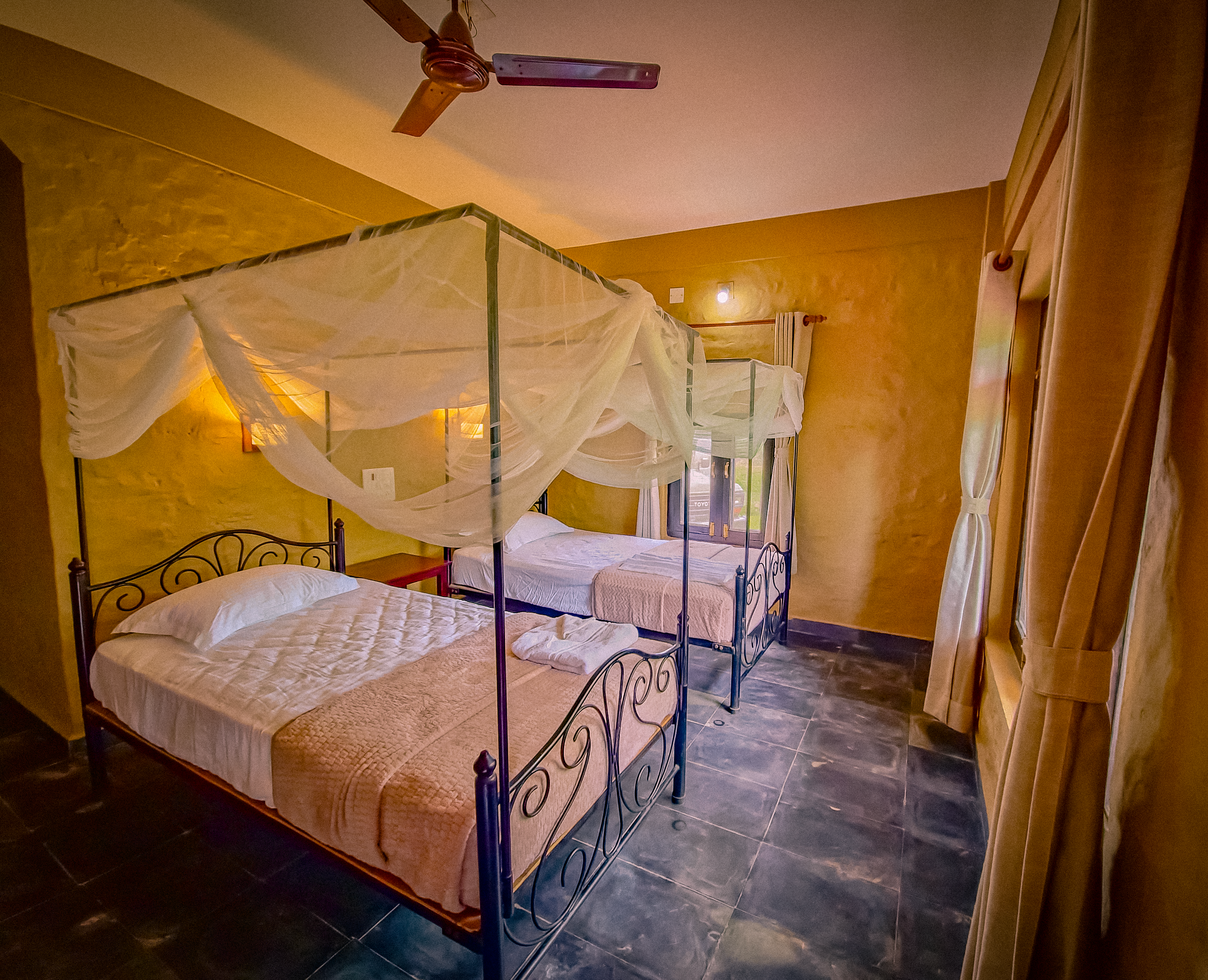 imgage of the bed-room and lobby of roomno.3 babai outback adventure, bardiya, Nepal, 2025